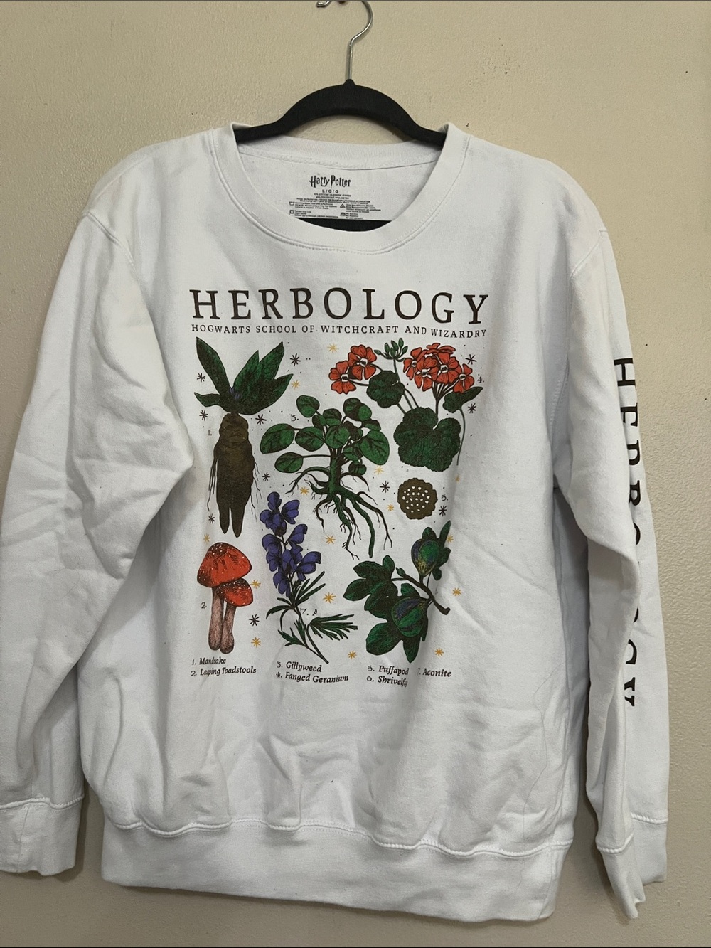Warner Bros. White Herbology Botanical Crewneck with Green & Orange Accents